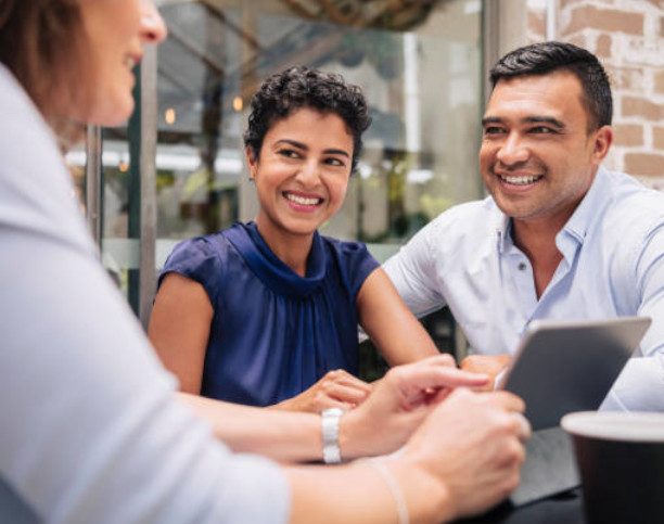 Smiling mature couple get good advice